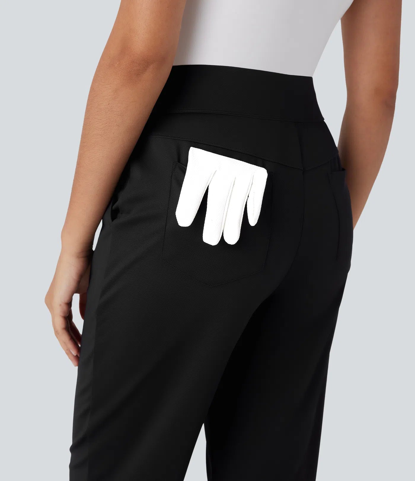 “Mid-rise, quick-drying golf pants with multiple pockets.”